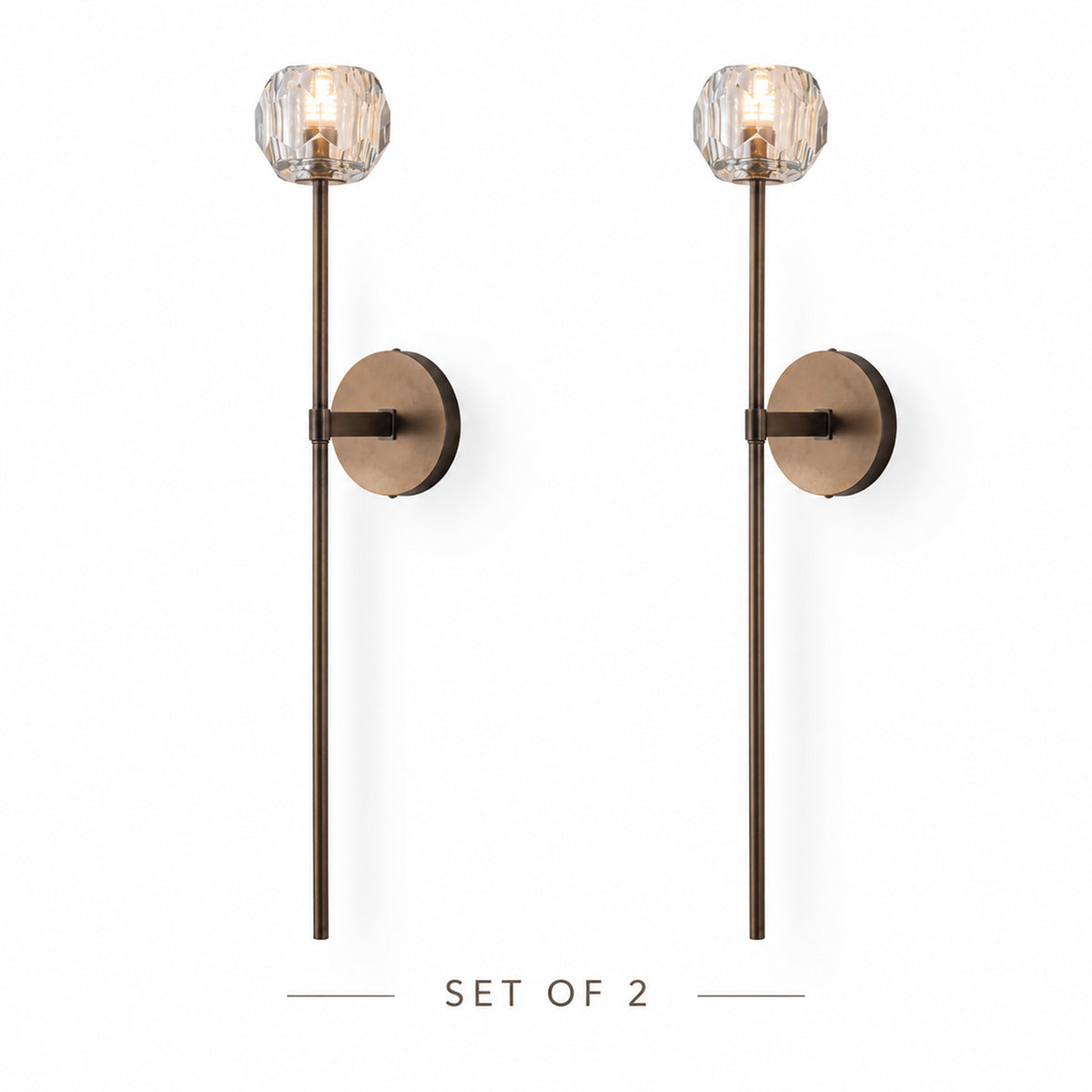 Set of 2 wall sconces crafted from rust-resistant stainless steel with textured bronze finish and faceted K9 crystal shades