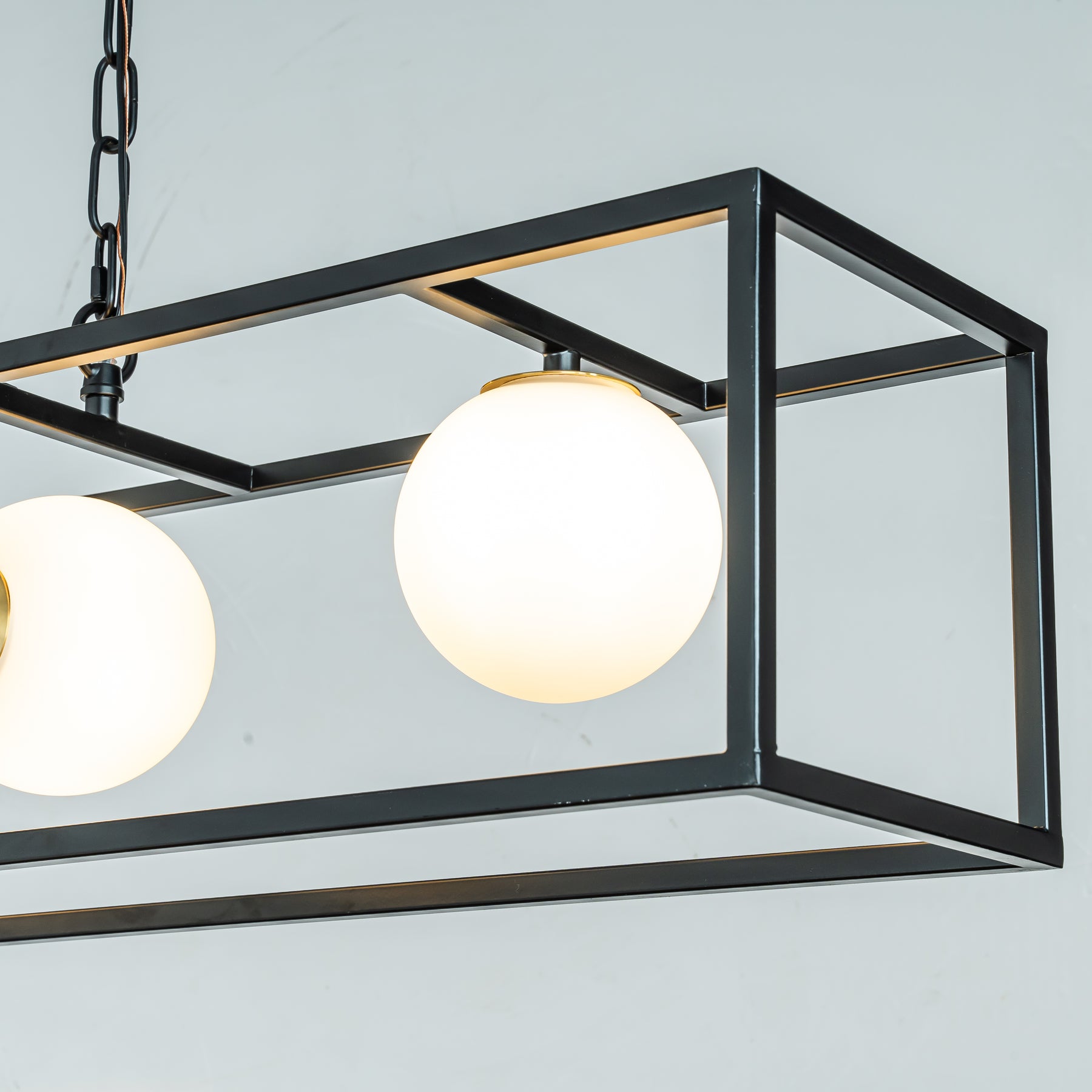 Modern Industrial Linear Rectangular Chandelier in Matte Black with Globe Glass Shade