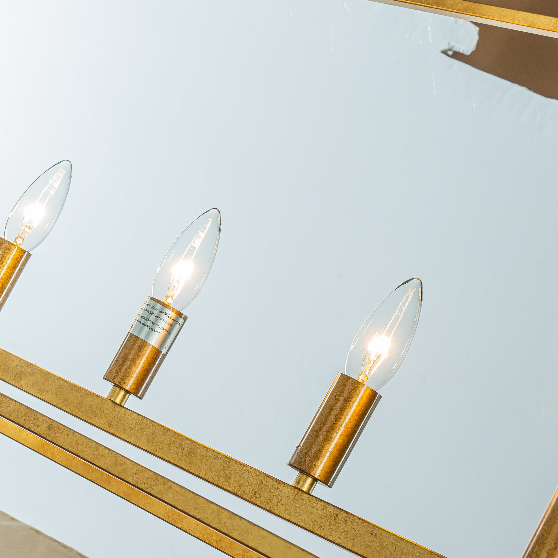 Farmhouse Linear Industrial Candlestick Cage Chandelier in Matte Gold