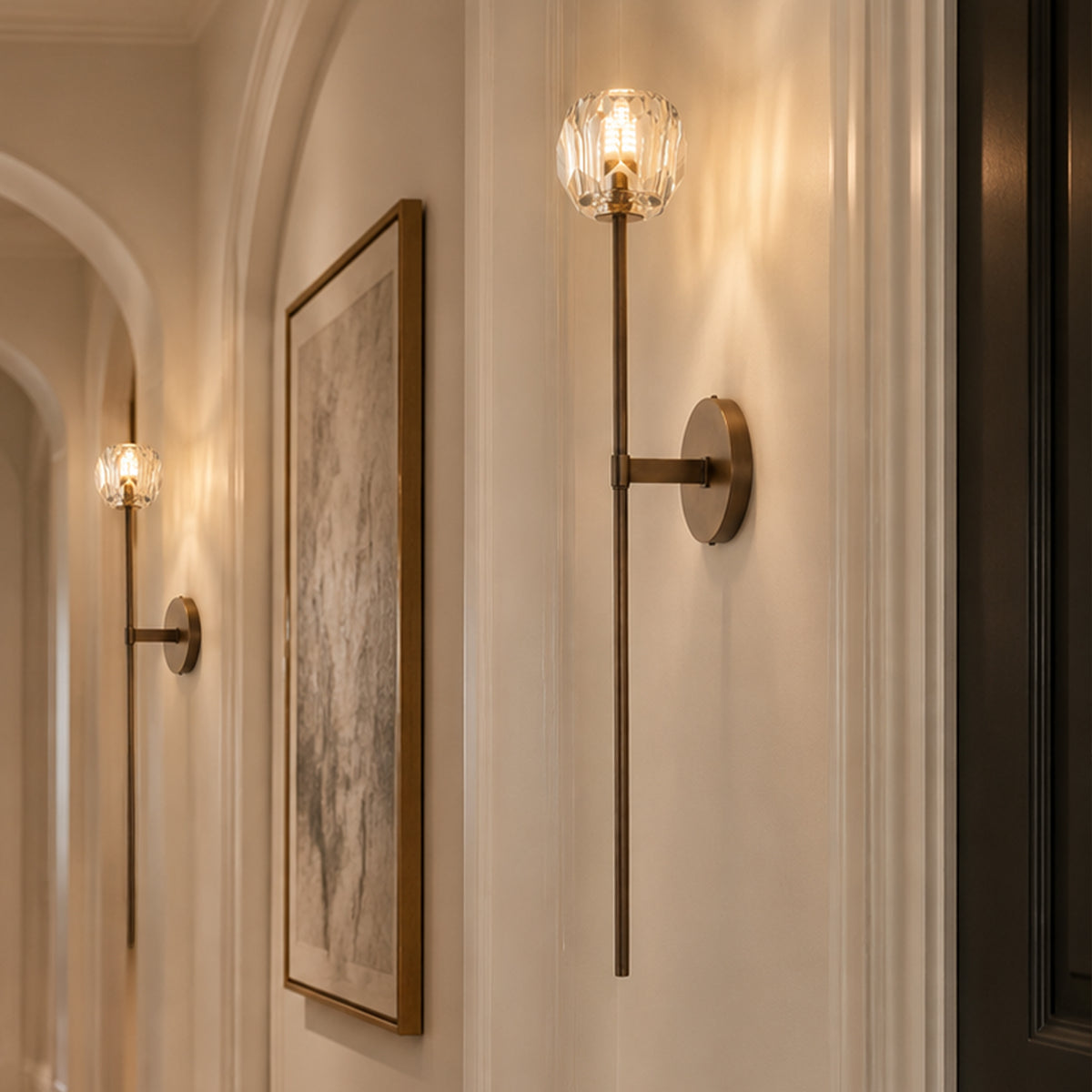 Set of 2 wall sconces crafted from rust-resistant stainless steel with textured bronze finish and faceted K9 crystal shades